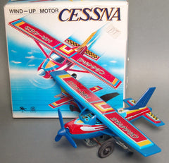 Vintage MTU Korea Wind Up Cessna Airplane